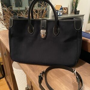Dooney & Bourke black logo canvas double handle tote bag with a crossbody strap